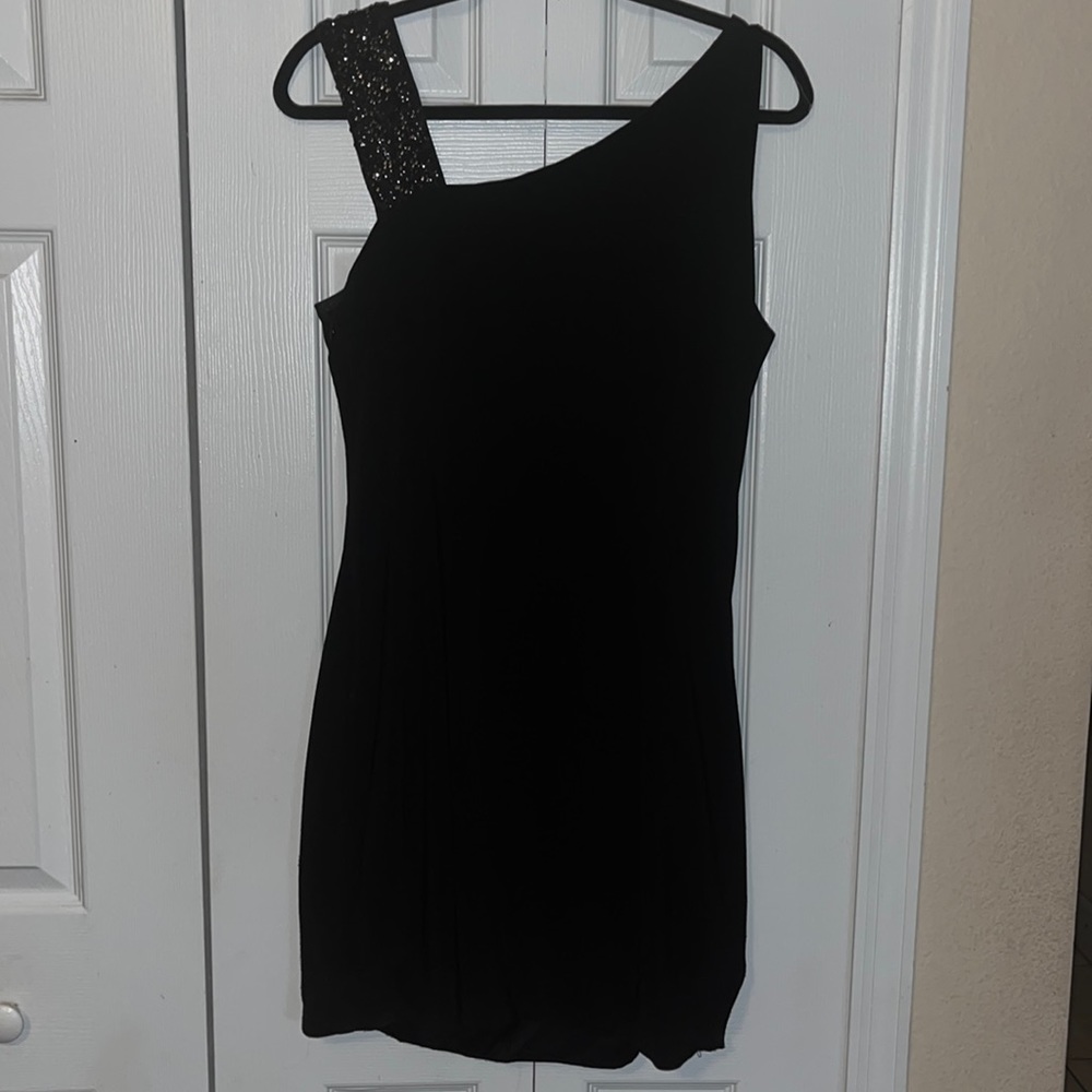 Black dress very elegant for evening wear size 16